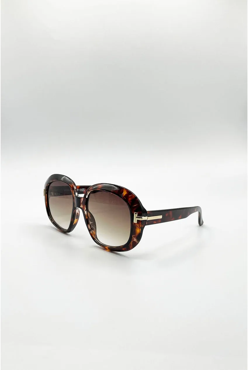 SVNX Bold Round occhiali sole tartarugati lenti marroni