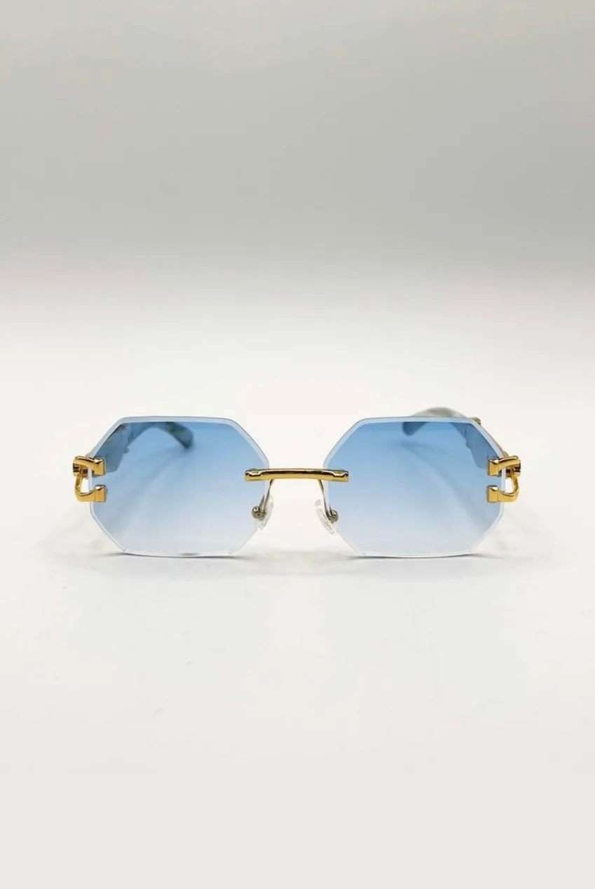 SVNX occhiali da sole ovali oro blu senza montatura