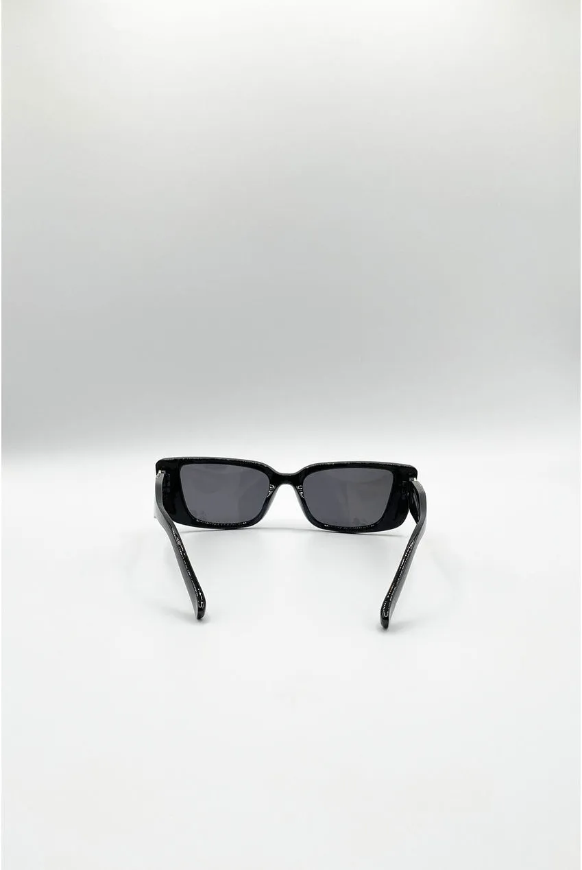SVNX SG2601802 occhiali sole neri oro cat-eye rettangolari