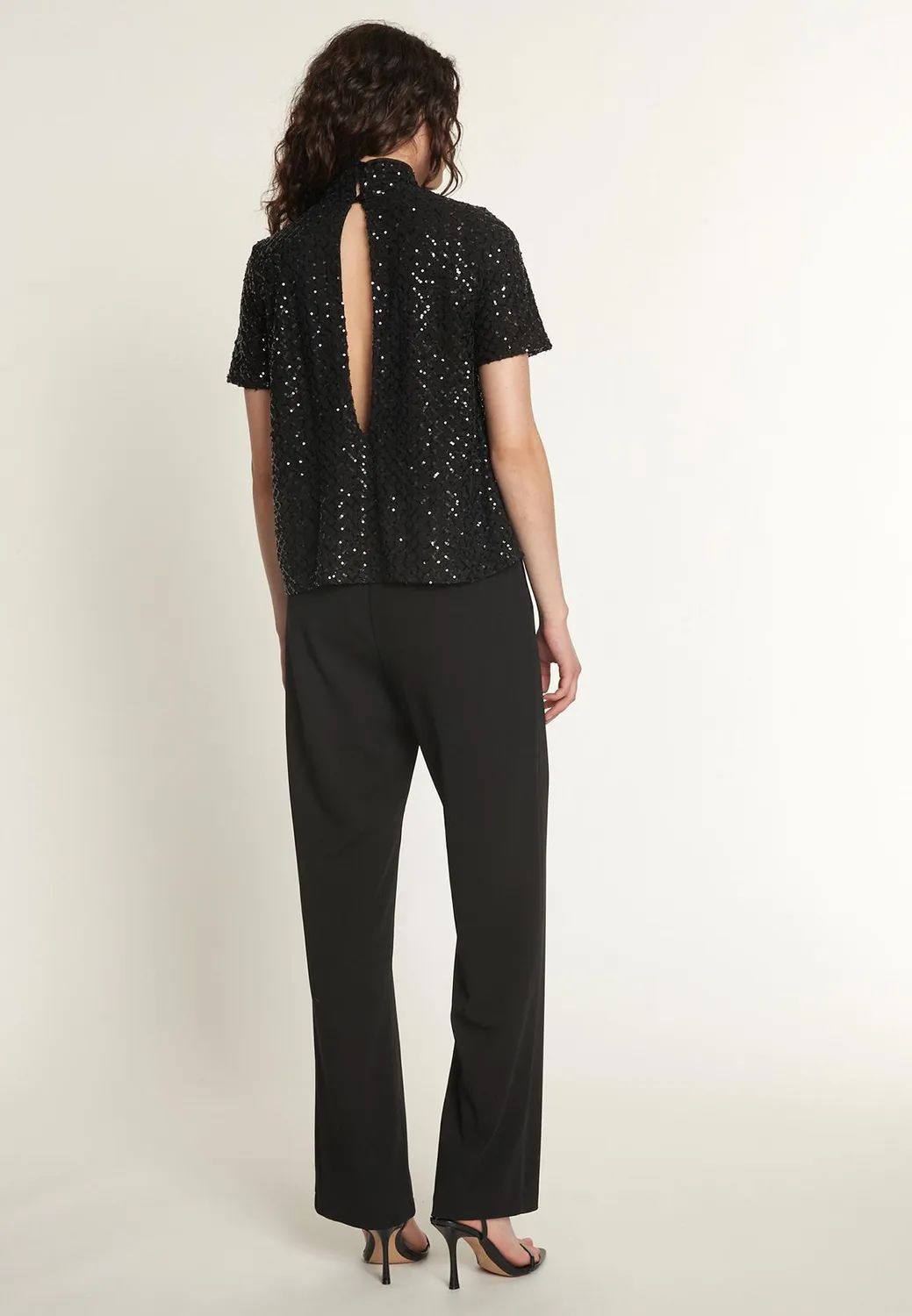 Ana Alcazar Odisa tuta jumpsuit nera paillettes sera