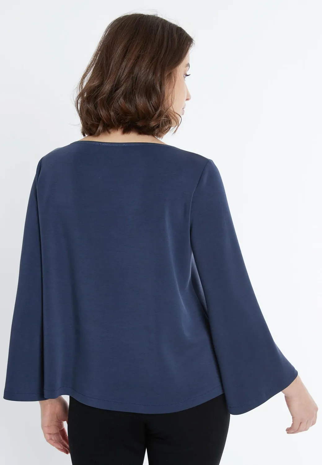 Ana Alcazar Serea top jersey blu maniche trombetta