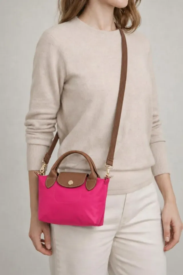 SVNX Mini Pouch Crossbody borsa fucsia tracolla