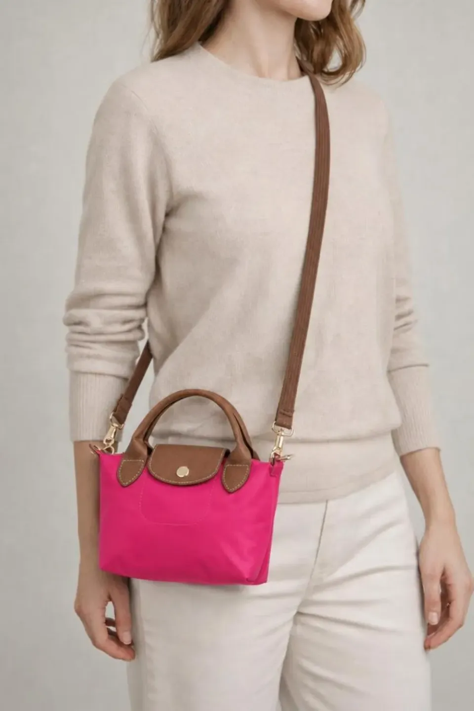 SVNX Mini Pouch Crossbody borsa fucsia tracolla
