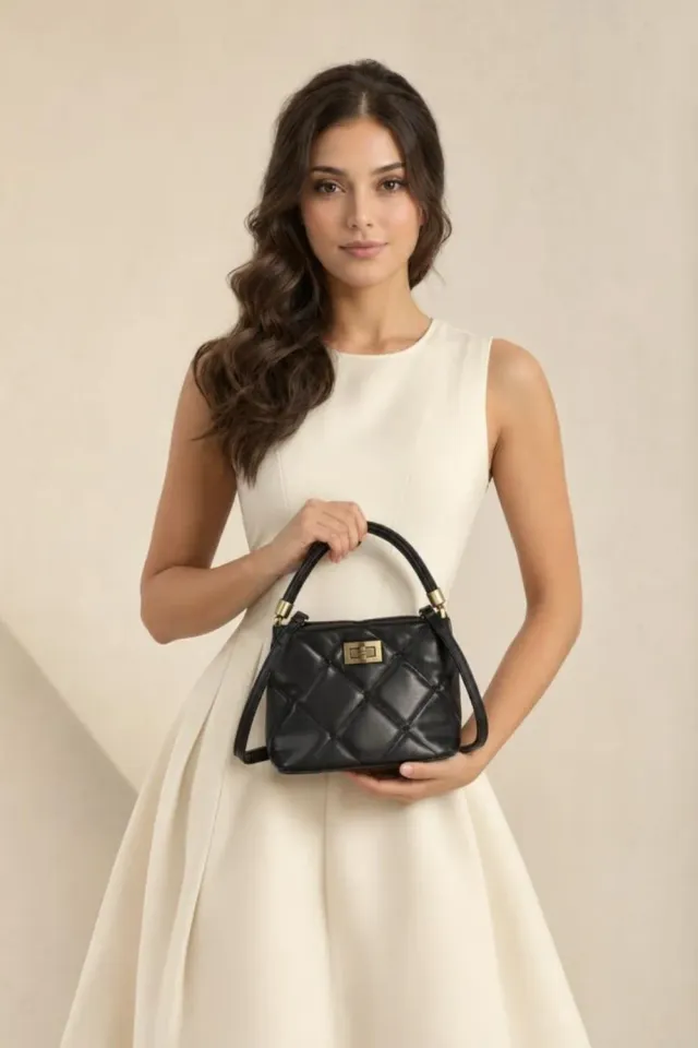 SVNX Quilted Top-Handle mini borsa nera trapuntata