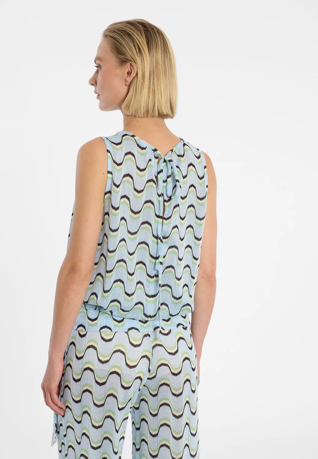 Ana Alcazar Dulna top in maglia azzurro con fiocco