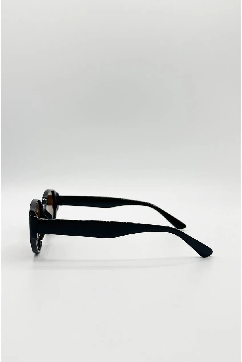 SVNX SG2600102 occhiali sole neri cat-eye