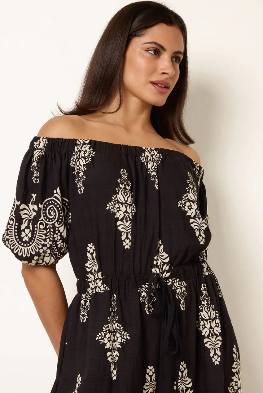Goddiva Blue Vanilla tuta nera spalle scoperte fantasia