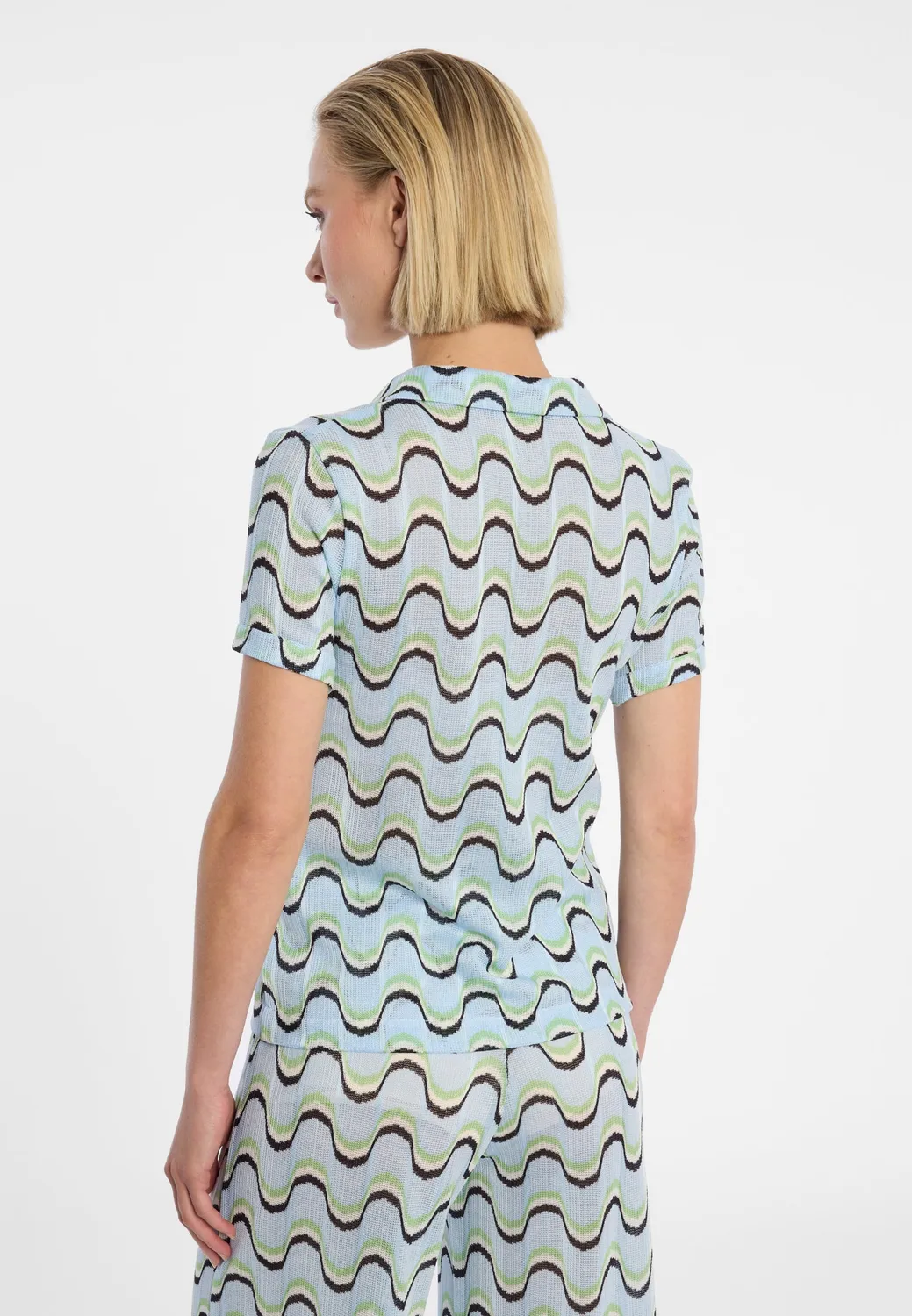 Ana Alcazar Dulya top polo azzurro maglia a onde