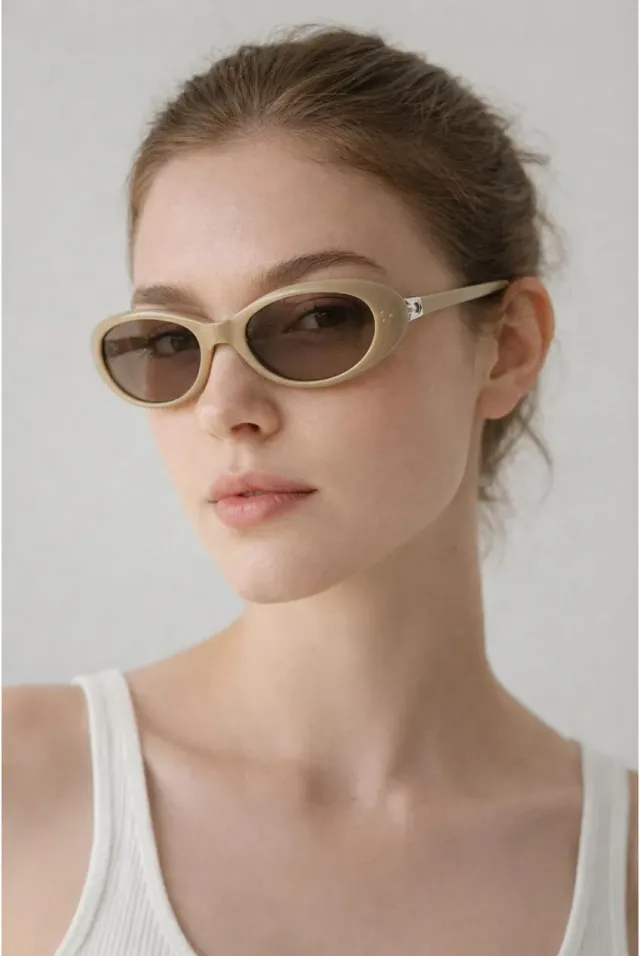SVNX occhiali da sole ovali beige pieghevoli UV400
