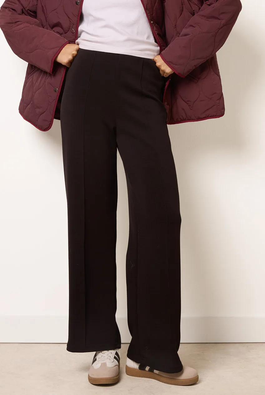 Goddiva Blue Vanilla Pintuck Pantaloni neri jersey gamba larga
