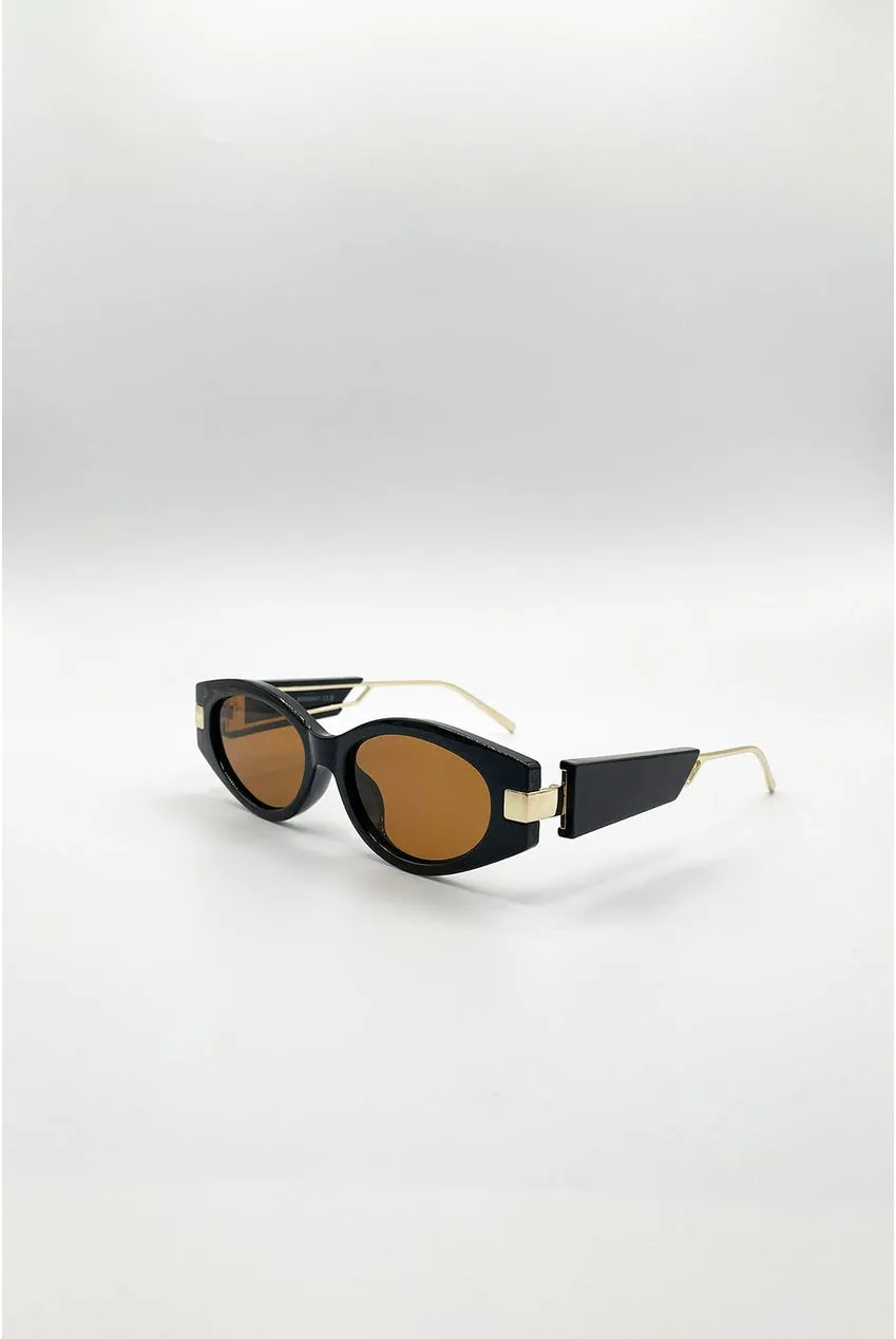 SVNX SG2600202 occhiali da sole nero ovali UV400