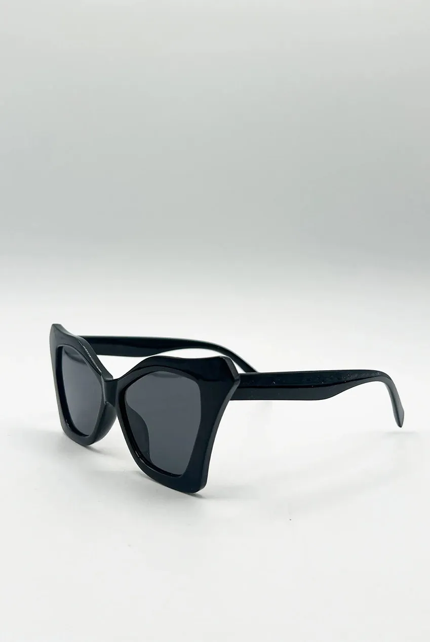 SVNX Cat-Eye SG2510802 occhiali da sole neri oversize UV400