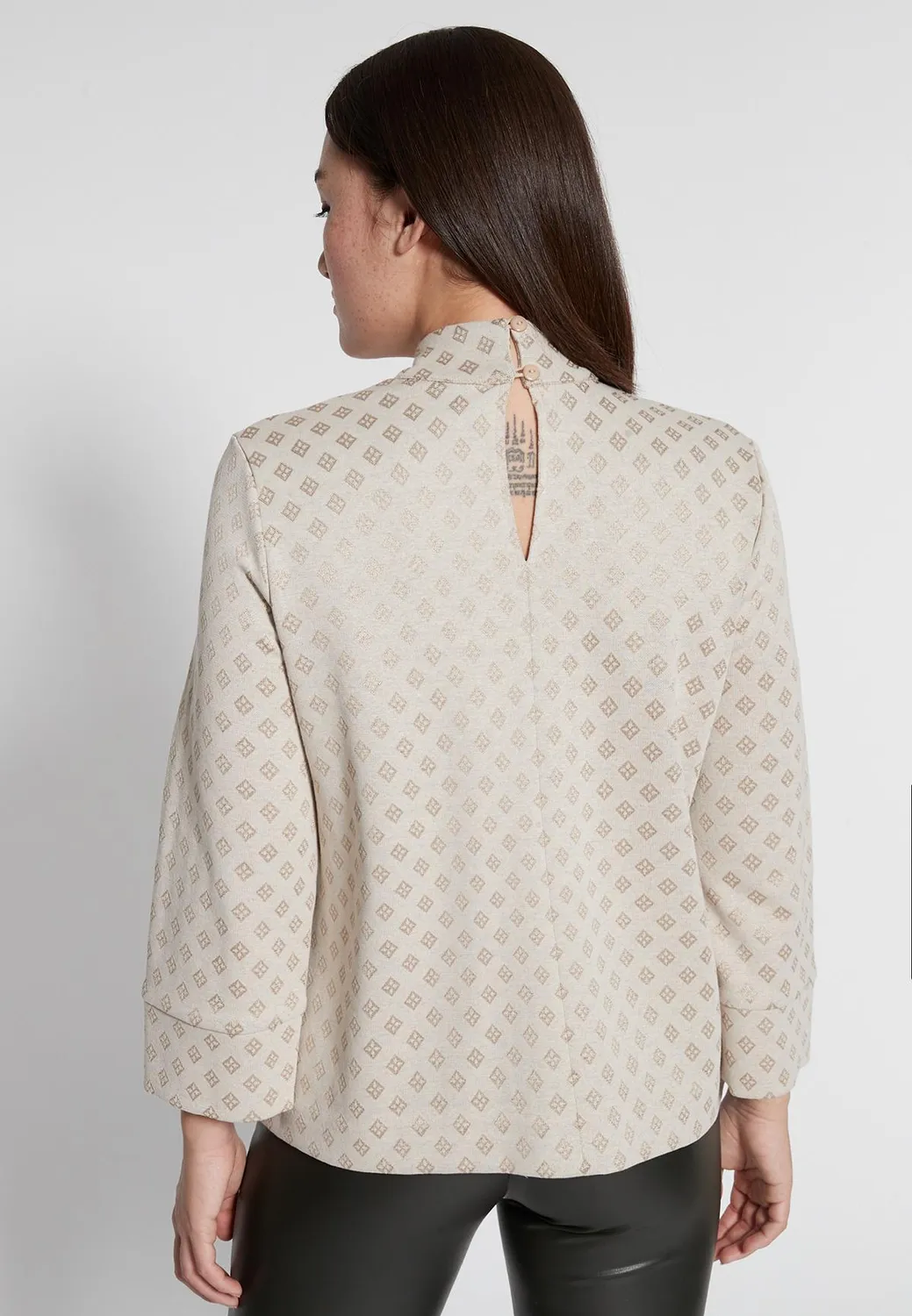 Ana Alcazar Hemmea top collo alto beige a quadri