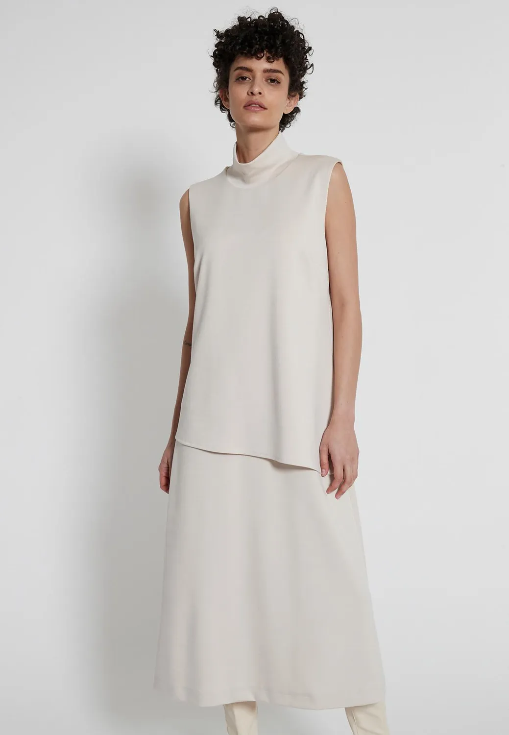 Ana Alcazar Hedis abito midi bianco collo alto asimmetrico