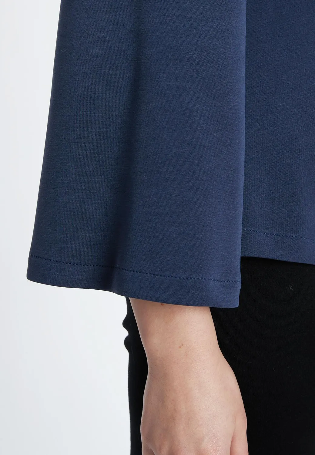 Ana Alcazar Serea top jersey blu maniche trombetta