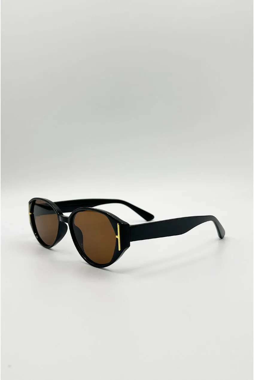 SVNX SG2600102 occhiali sole neri cat-eye