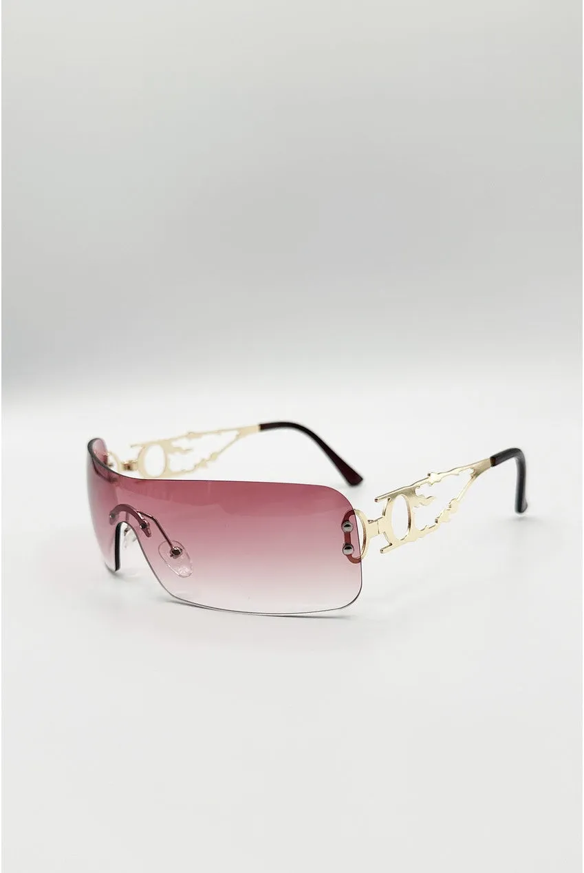 SVNX Flat Top Racer occhiali rossi montatura oro