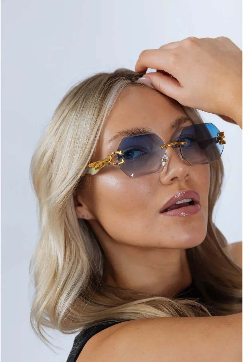 SVNX occhiali da sole ovali oro blu senza montatura
