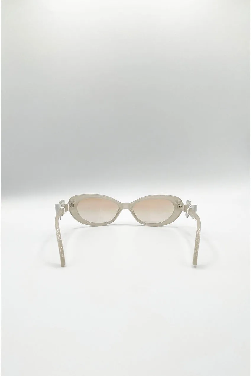 SVNX Bow Side Detail occhiali da sole nude