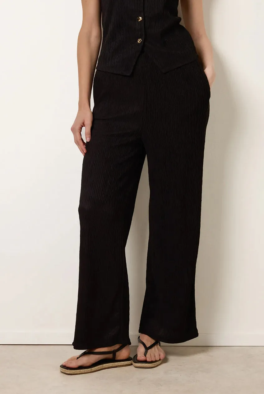 Blue Vanilla SS26008B003 pantaloni neri a zampa vita elasticizzata