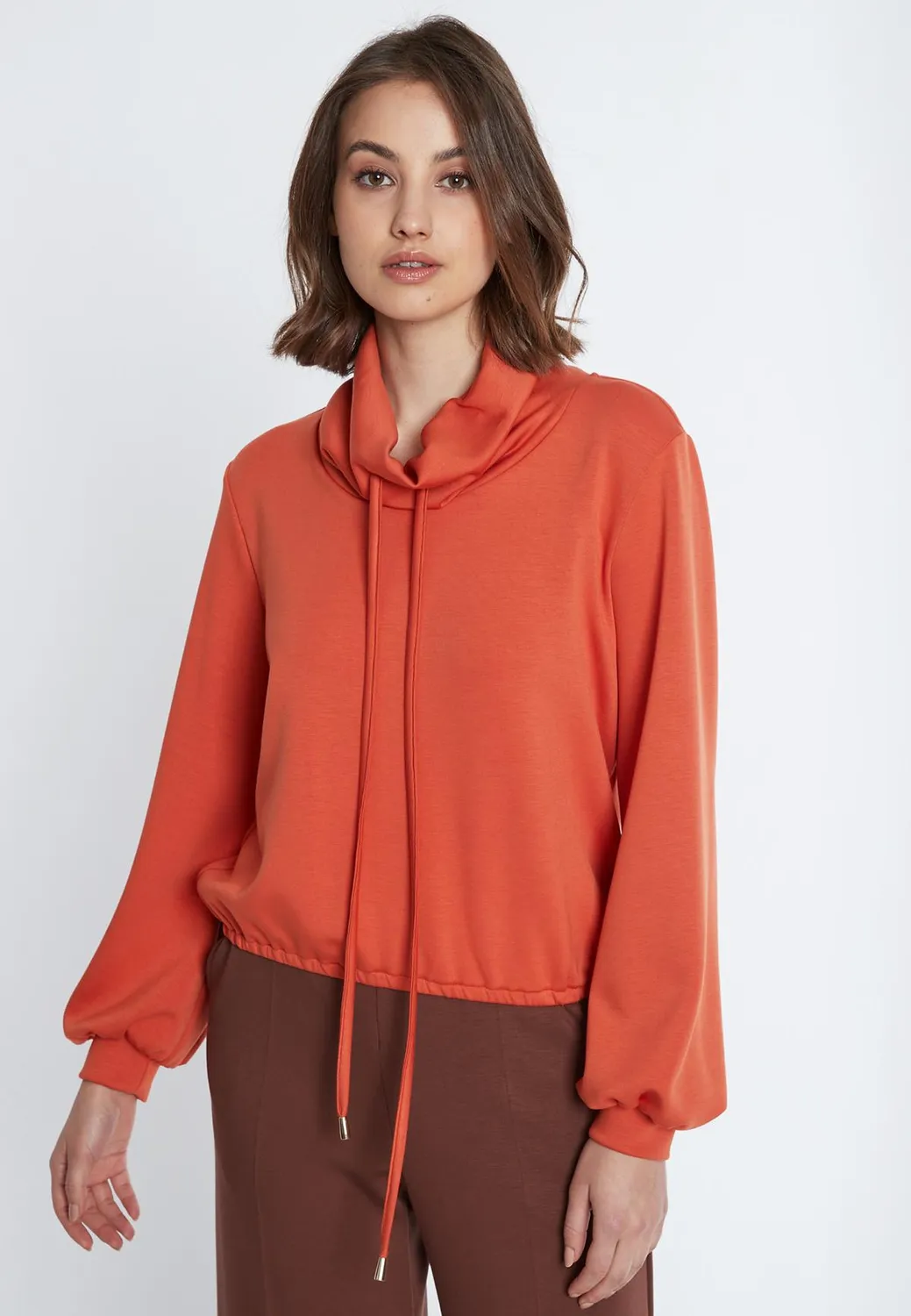 Ana Alcazar Selma top collo alto arancione in jersey