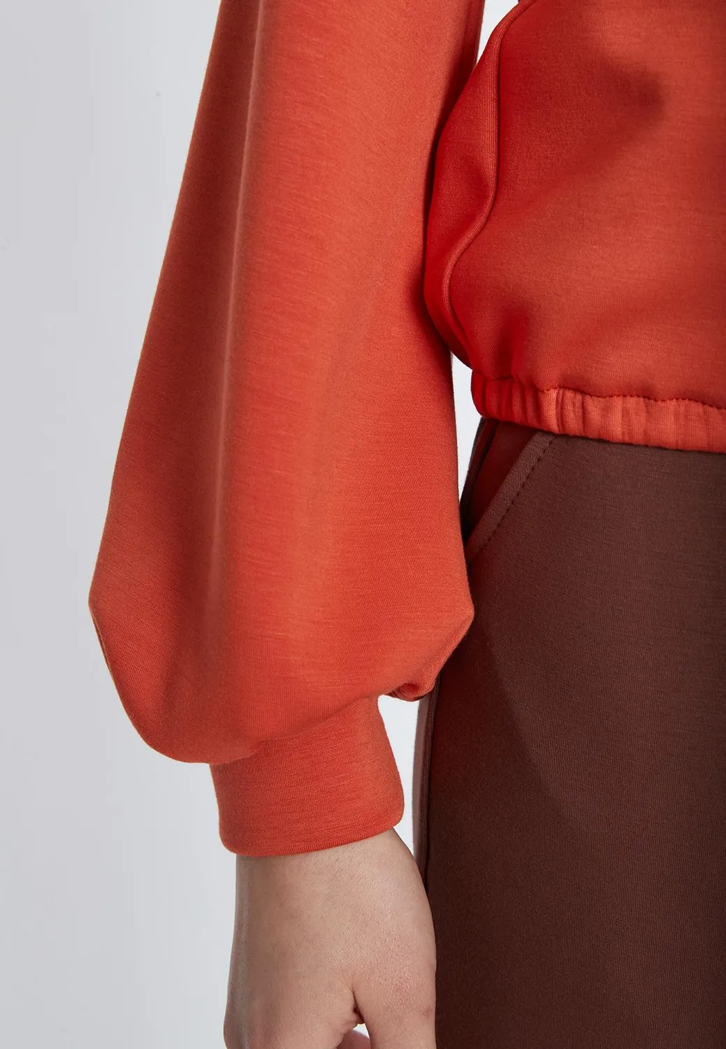 Ana Alcazar Selma top collo alto arancione in jersey