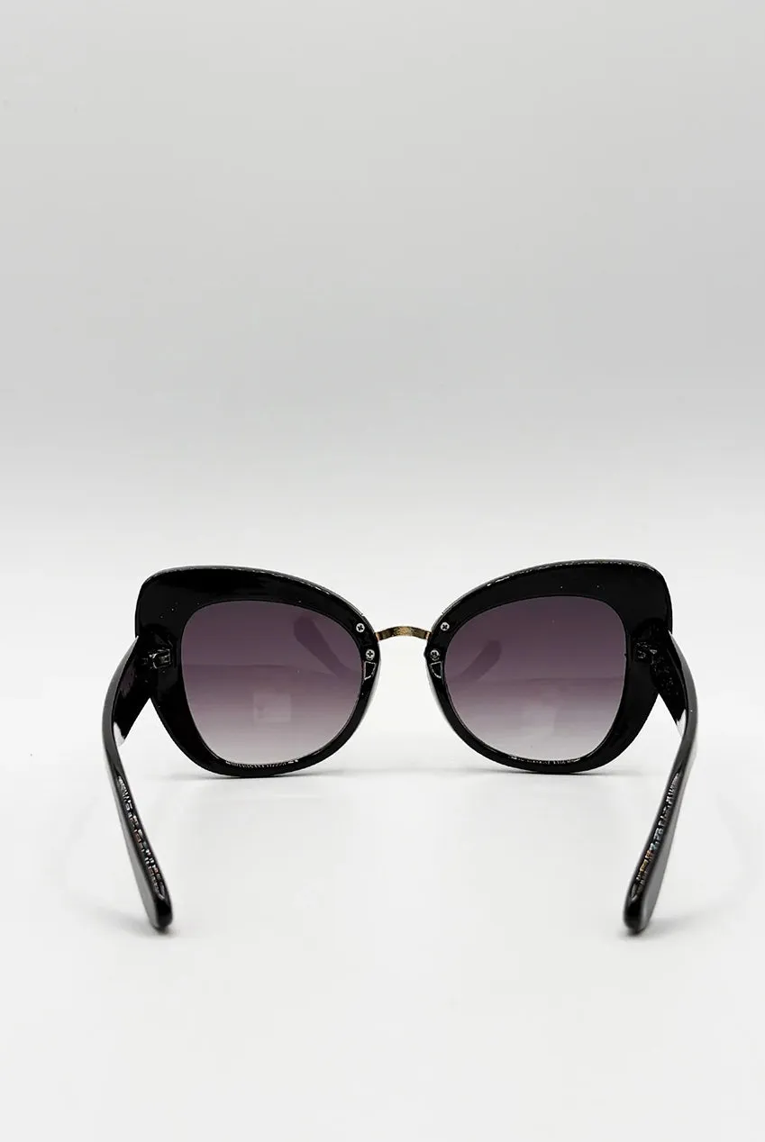 SVNX occhiali da sole cat-eye oversize neri