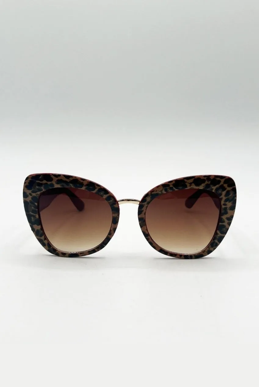 SVNX Oversized Cat-Eye occhiali da sole marrone leopardati