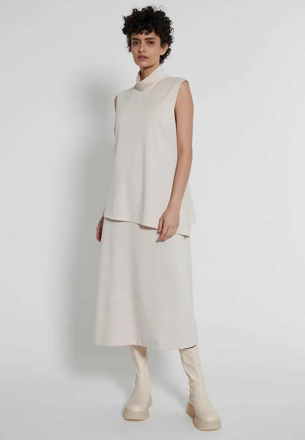 Ana Alcazar Hedis abito midi bianco collo alto asimmetrico