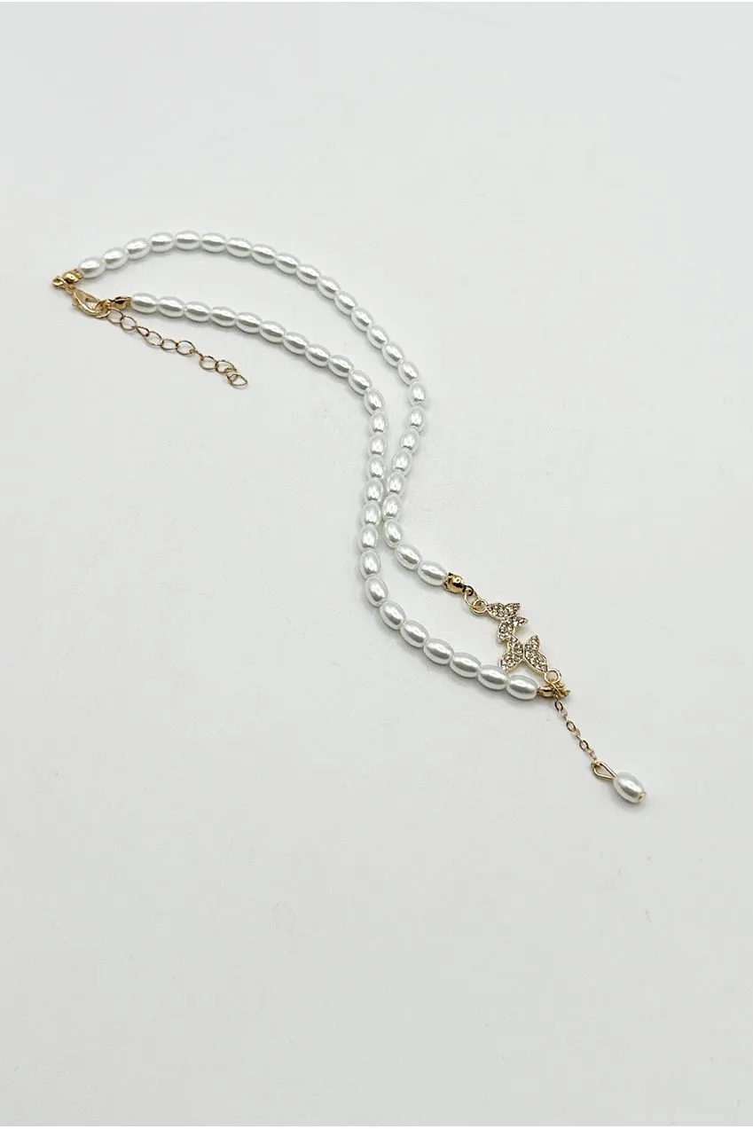SVNX Pearl Chain collana perle bianche farfalla 43 cm