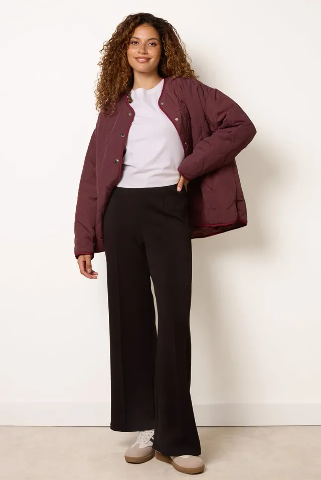 Goddiva Blue Vanilla Pintuck Pantaloni neri jersey gamba larga
