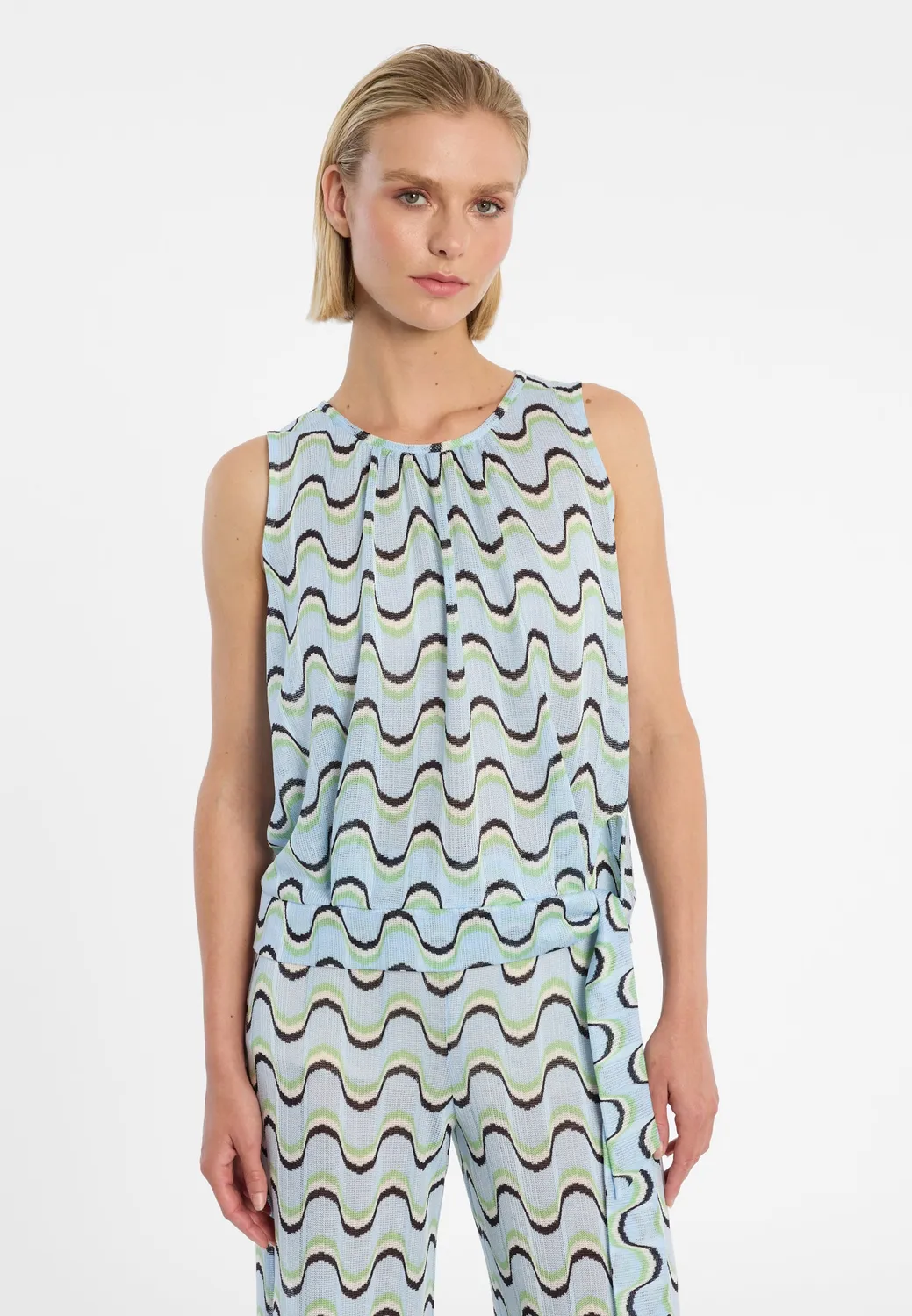 Ana Alcazar Dulna top in maglia azzurro con fiocco