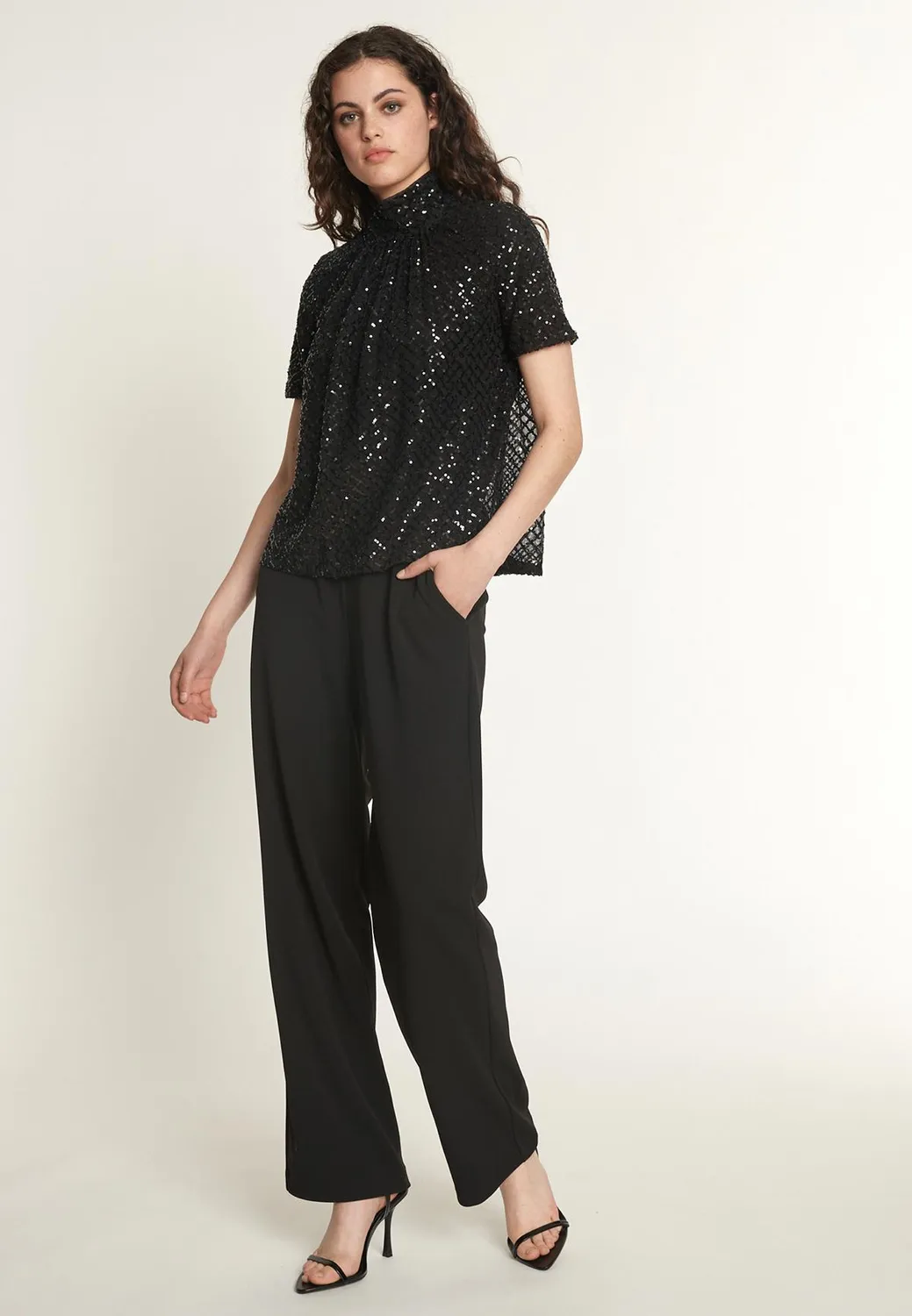 Ana Alcazar Odisa tuta jumpsuit nera paillettes sera