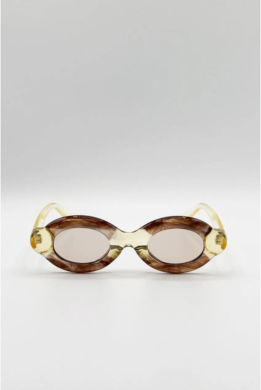 SVNX Bold occhiali da sole ovali champagne marrone chiaro
