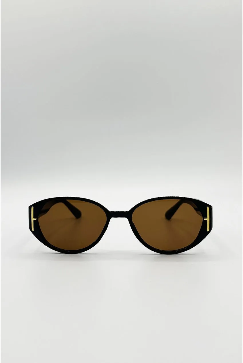 SVNX SG2600102 occhiali sole neri cat-eye