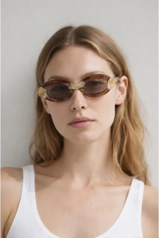 SVNX Bold occhiali da sole ovali champagne marrone chiaro