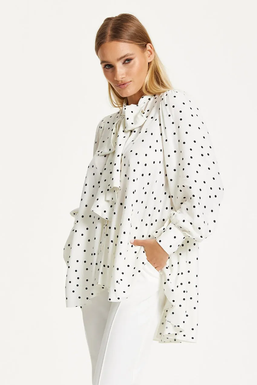 Liquorish Polka Dot Ruffle High-Low camicetta bianca pois