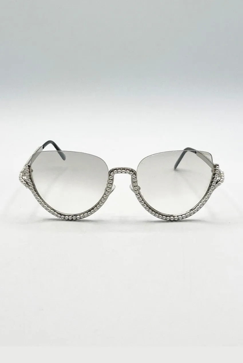 SVNX SG2503321 occhiali da sole argento lenti grigie