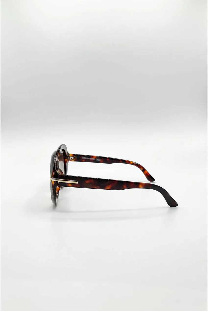 SVNX Bold Round occhiali sole tartarugati lenti marroni