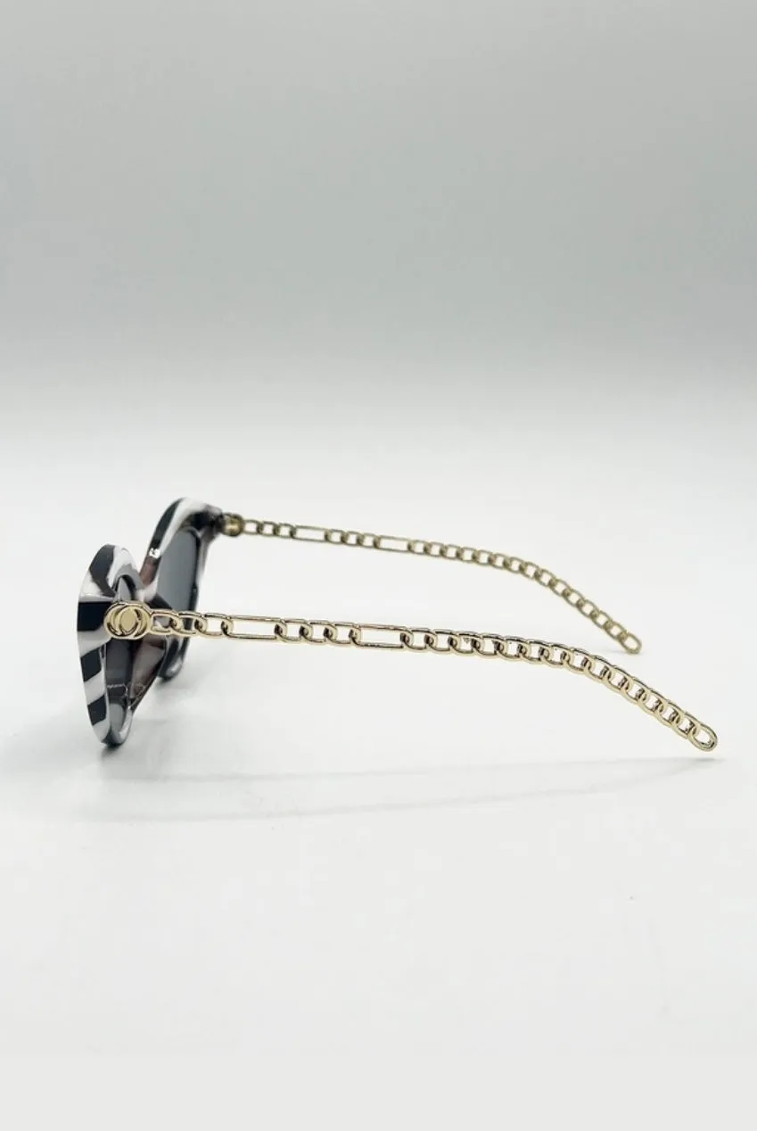SVNX Cat-Eye occhiali da sole nero righe bianco oro