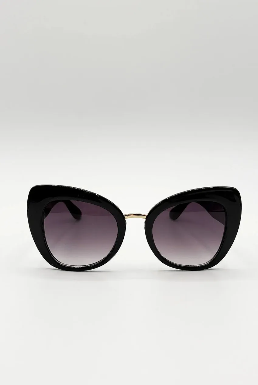 SVNX occhiali da sole cat-eye oversize neri