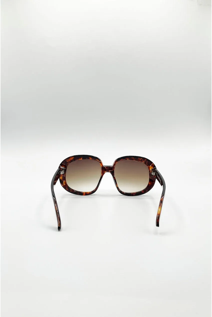 SVNX Bold Round occhiali sole tartarugati lenti marroni