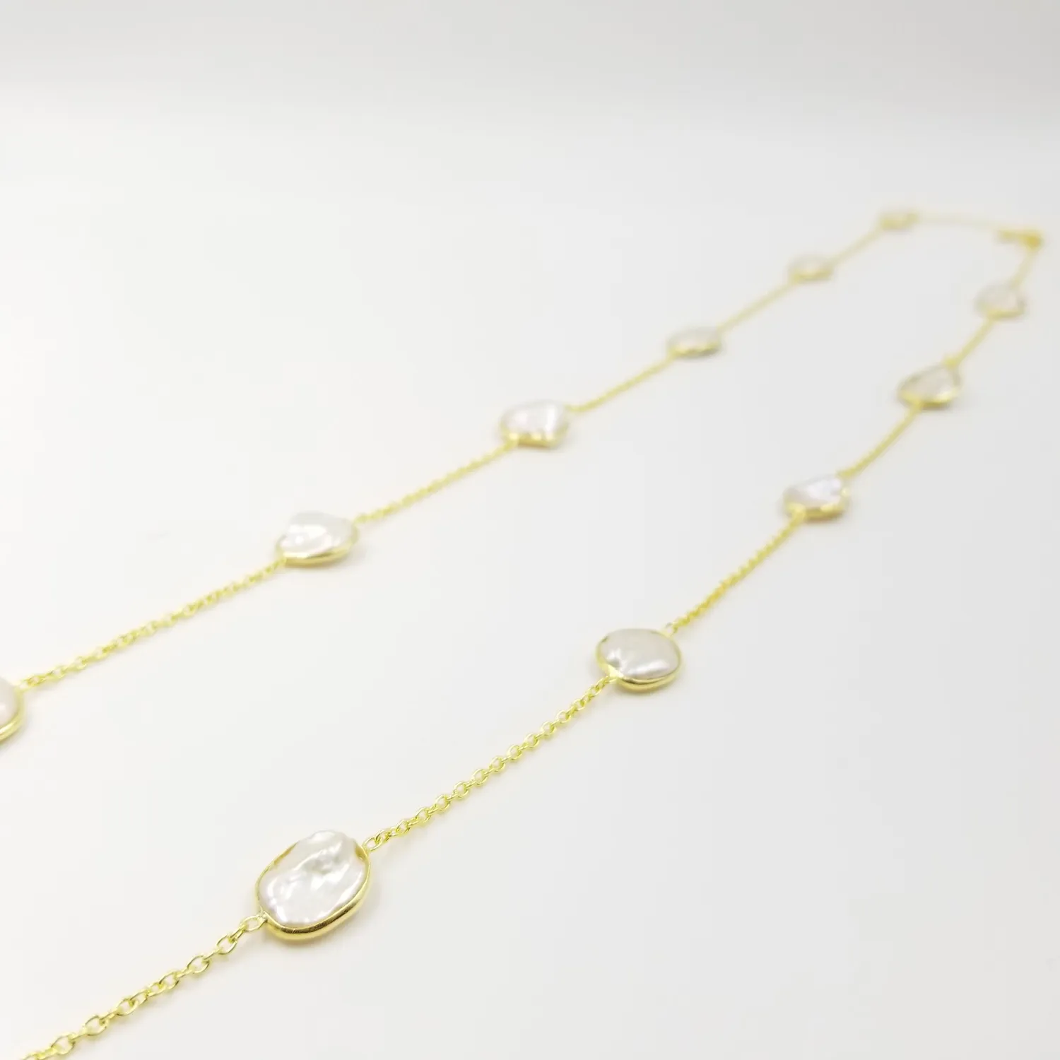 Our Dve Oval Running Water collana perle oro 18k