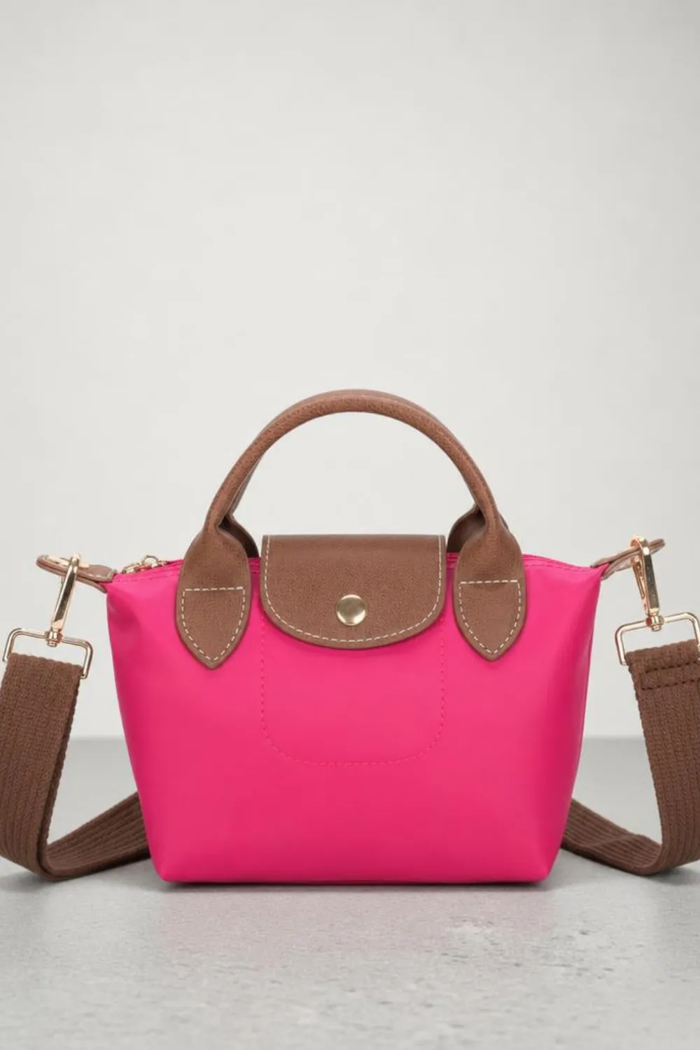 SVNX Mini Pouch Crossbody borsa fucsia tracolla