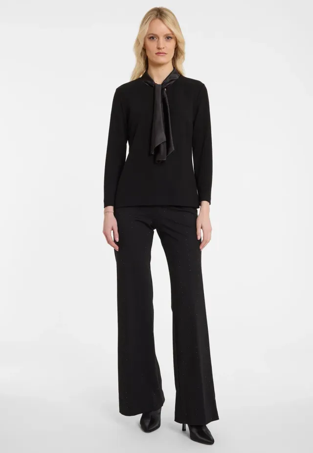 Ana Alcazar Agini top nero jersey con cravatta