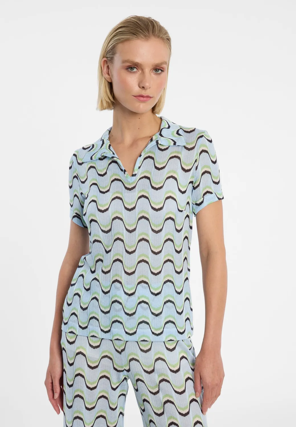 Ana Alcazar Dulya top polo azzurro maglia a onde
