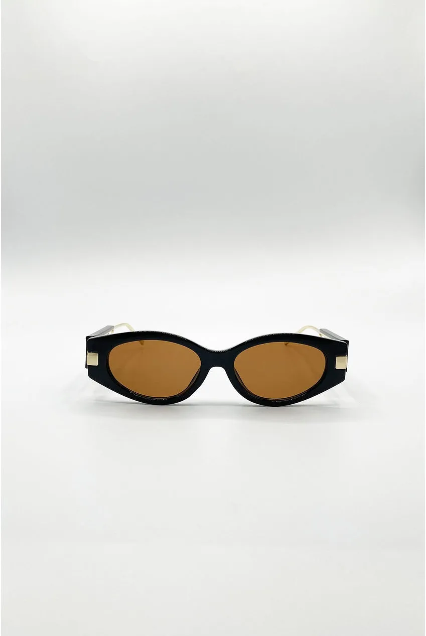 SVNX SG2600202 occhiali da sole nero ovali UV400
