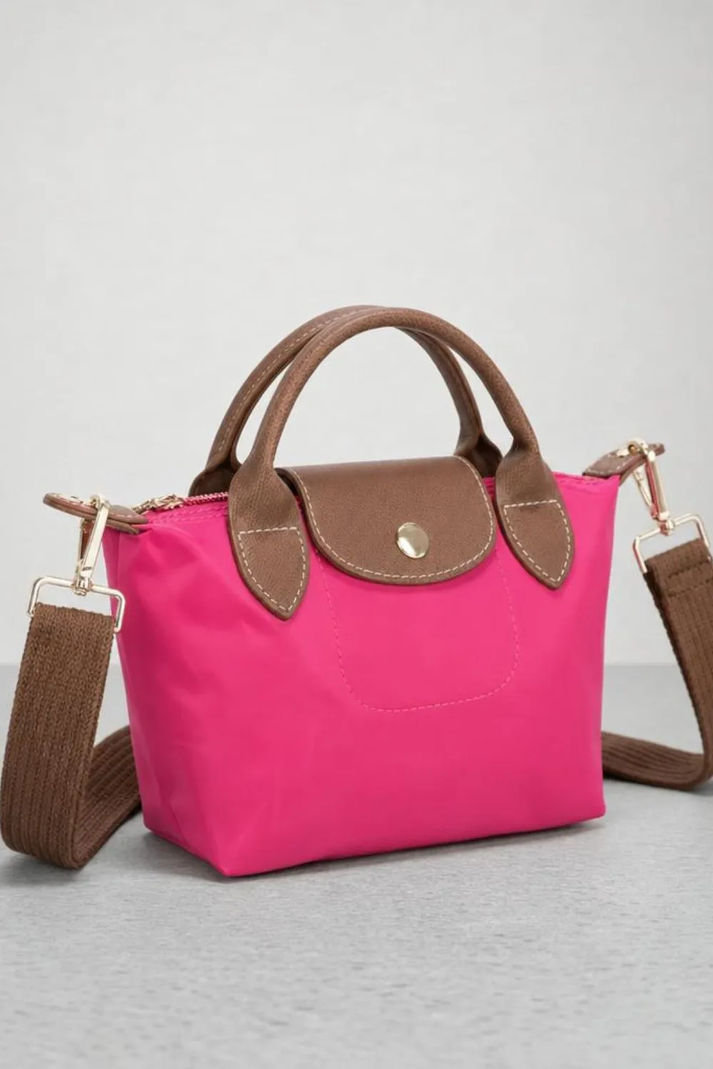 SVNX Mini Pouch Crossbody borsa fucsia tracolla