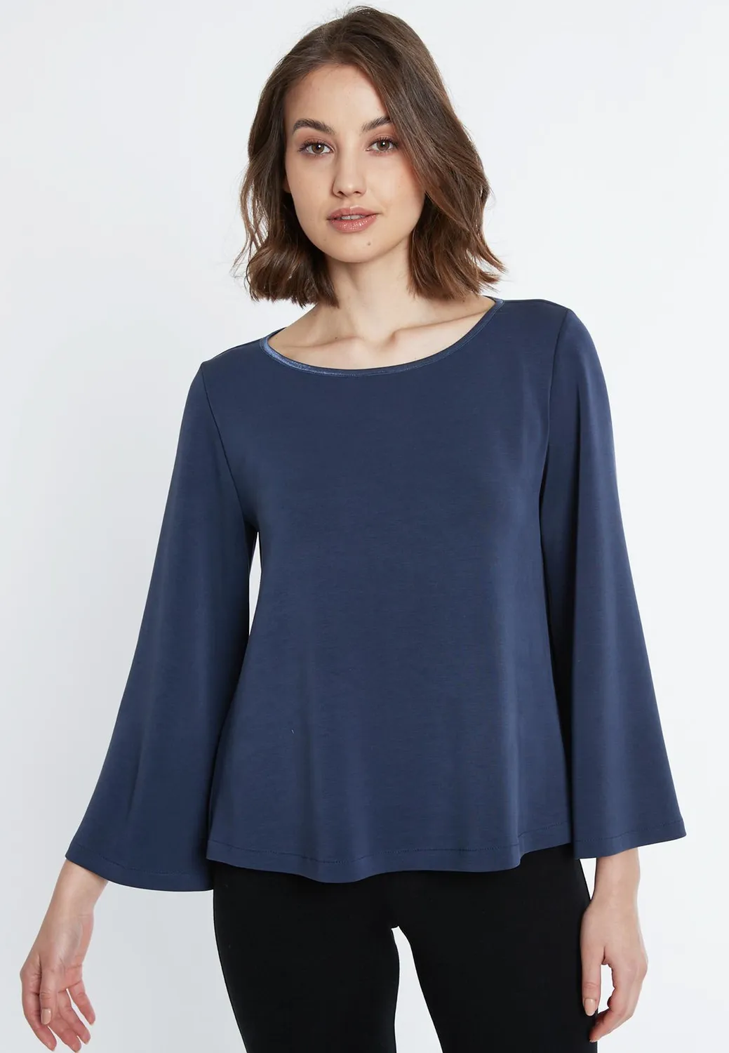 Ana Alcazar Serea top jersey blu maniche trombetta