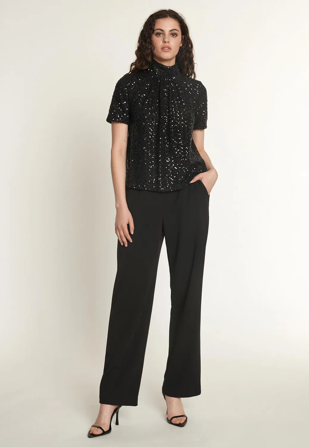 Ana Alcazar Odisa tuta jumpsuit nera paillettes sera